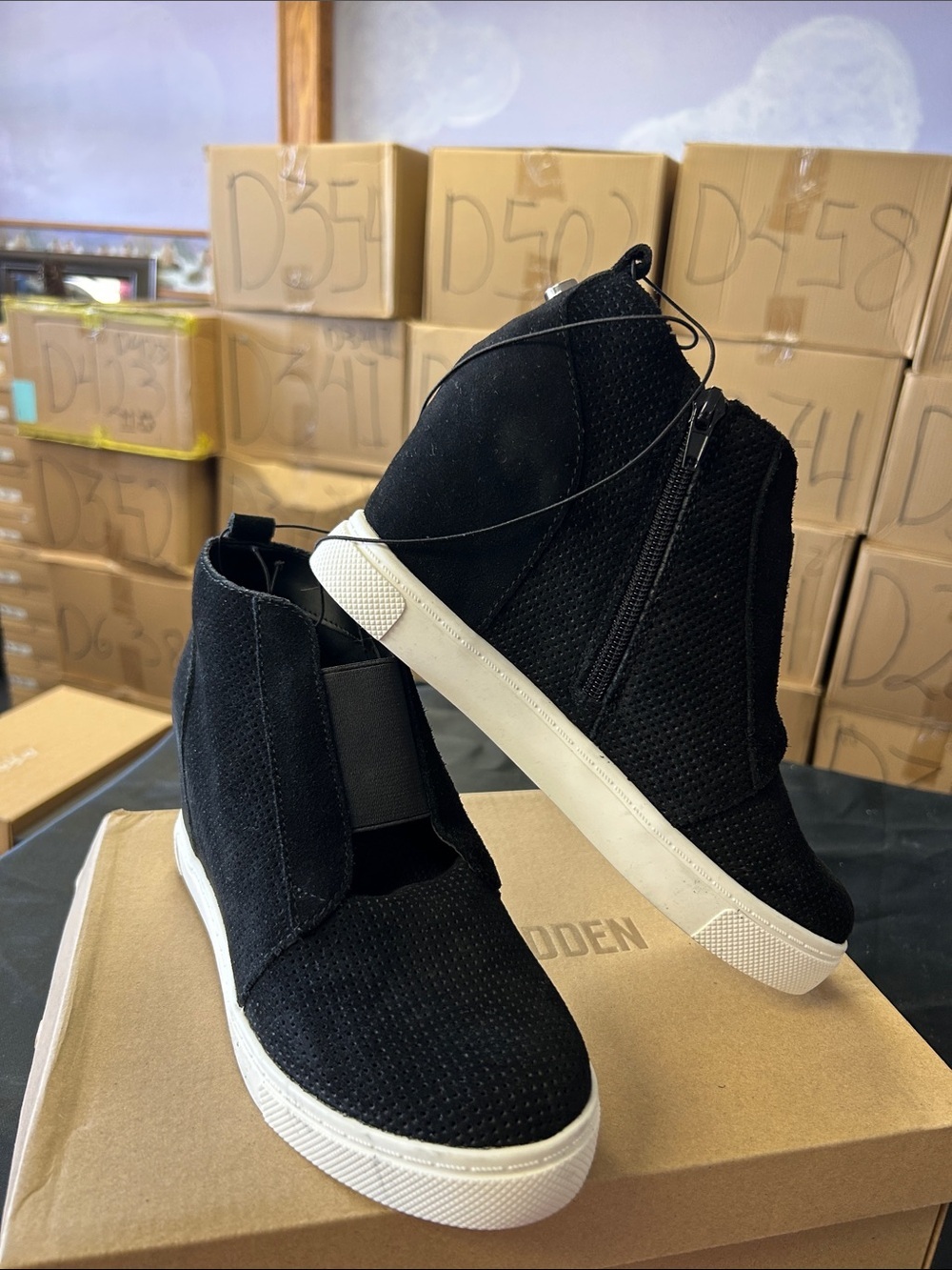 Steve Madden Black High-Top Slip-On Sneakers with White Sole